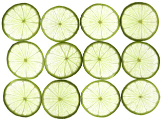 Lime slices on white background