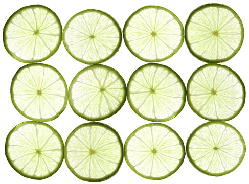 Lime slices on white background
