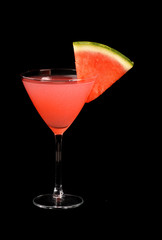 A watermelon martini with a watermelon slice