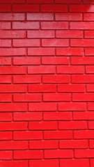 Fototapeta na wymiar Red Painted Brick Wall