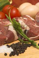 Lamb Chops, chives and parsley ,eggs and tomatoes