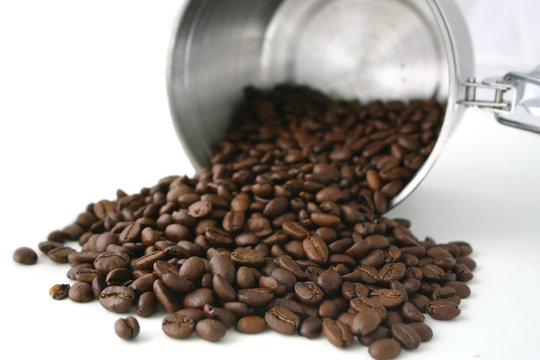 Coffee Beans Spilling From Canister