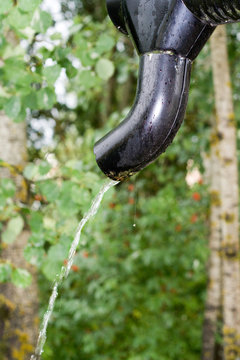 Water running from a roof gutter