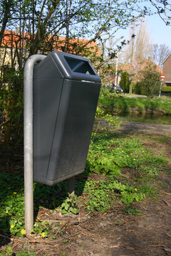 Grey garbage can 