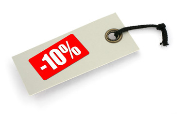 close-up of a Sale tag against white, 