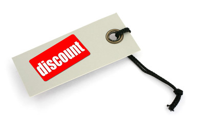 close-up of a Sale tag against white, 