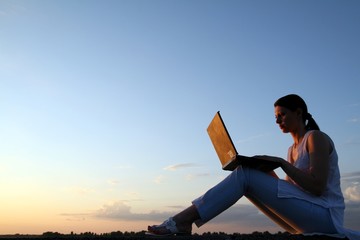 girl with laptop - obrazy, fototapety, plakaty