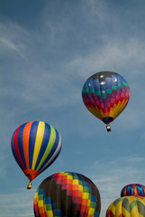 Fototapeta na wymiar Hot Air Balloons against a bright blue sky