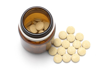 Bottle of Pills on White Background