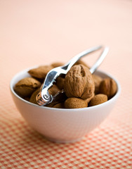 Assortment of nuts in white bowl