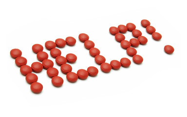 Red pills spelling the word help over white background