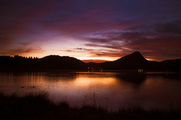 Sunrise on a lake in Colorado with Mountains
