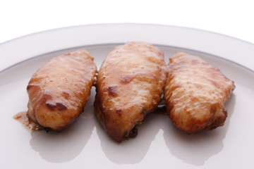 Cooked chicken wings on a plate
