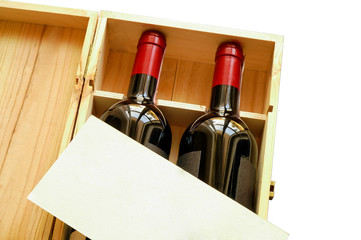 Wood gift box with wine bottles and card with clipping path