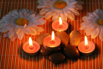 Aromatic candles and  pebbles for spa session