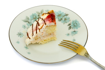 Cake on plate and fork, isolated on white background