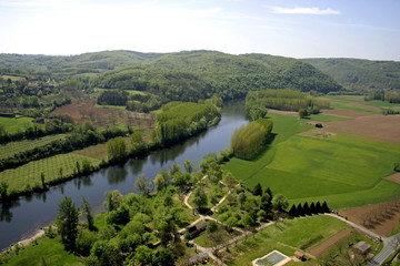 wide landscape view of fields and river, france