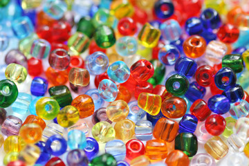 Colorful small glass beads (selective focus)