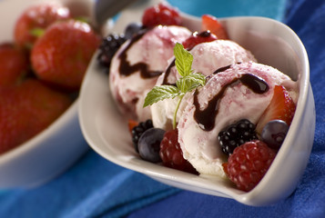 ice cream with fresh fruits in a bowl close up