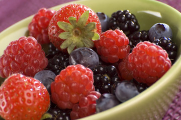 Blueberry, strawberry, raspberry and blackberry in a bowl 