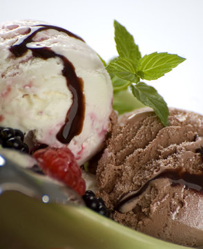 fruit an chocolate ice cream with mint close up shoot