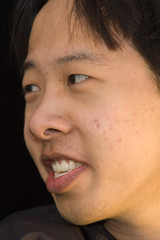 Obraz premium young asian man smiling