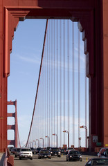 Golden Gate cars framed by tower