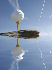 golf ball reflected in the water
