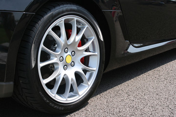 Wheel on black sports car
