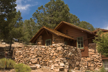 Fototapeta na wymiar Mountain Cabin with rock wall porch