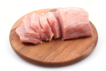boneless pork loin on board - isolated on white