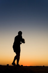 football at sunset