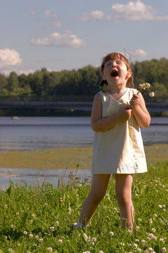 Little girl full of emotions is Singing