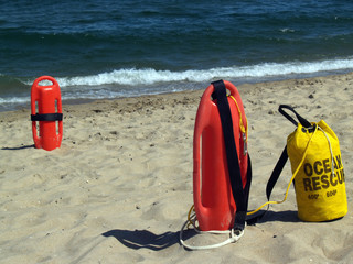 Ocean Rescue Gear -- Patrol Rescue Can and Rope Bag near Water