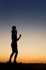 football at sunset