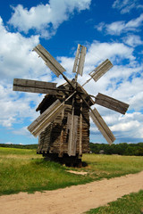 Fototapeta na wymiar Old wodden windmill