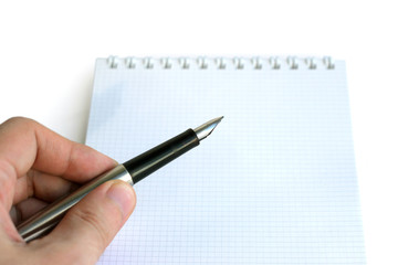 Hand, Pen and Note on white