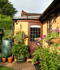 Flowering Baskets and Planters in an English Back Garden