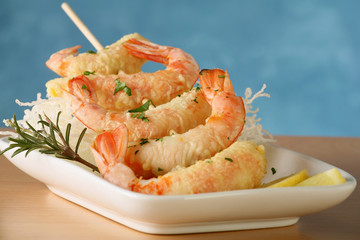 Tempura Jumbo Shrimp skewer on table with fried rice pasta