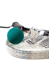 Close up shot of racquetball gear on a white background.