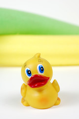 A close-up of a rubber ducky bath toy