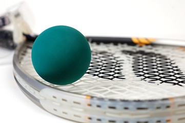 Close up shot of racquetball gear on a white background.