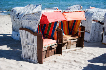 roofed wicker beach chair on the beach