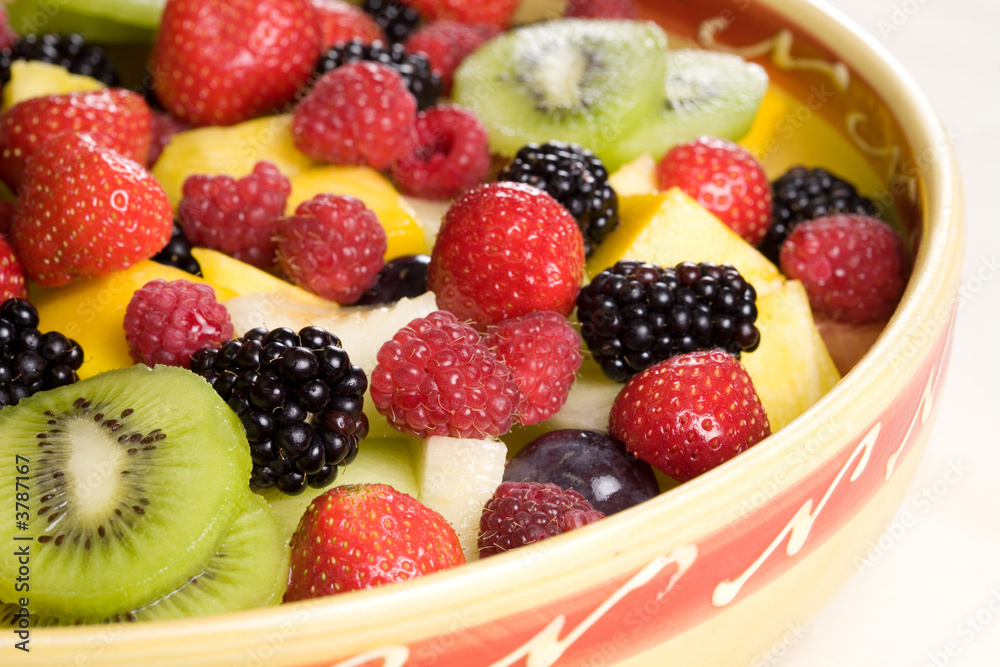 Wall mural Delicious fruit salad in a bowl