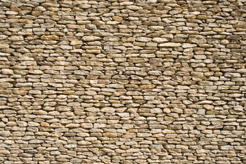 the detail of a wall made of stones