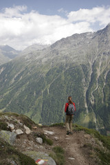 Fototapeta na wymiar Woman hiking in mountains