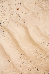 Sand with wave patterns made by wind