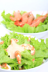 white bowl with prawns salad and mayonnaise sauce