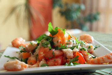prawn cocktail with vegetables on white platter