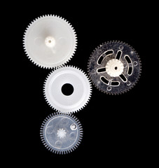 set of gears isolated on black background